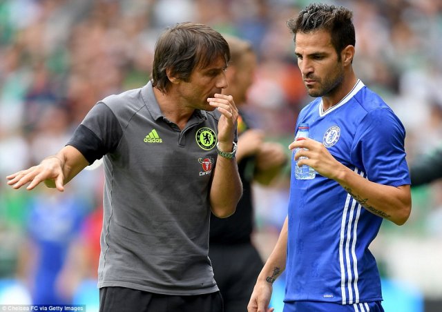 Cesc Fabregas is given instructions by Antonio Conte as the Spaniard ___.jpg