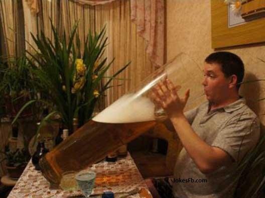 funny-man-drinking-beer-in-biggest-glass-of-world.jpg.29895f689399eb2e8b7f9e52d6438f1e.jpg