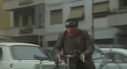 fantozzi_bici.gif.0b1df841871b76ff4c2494751762f52c.gif