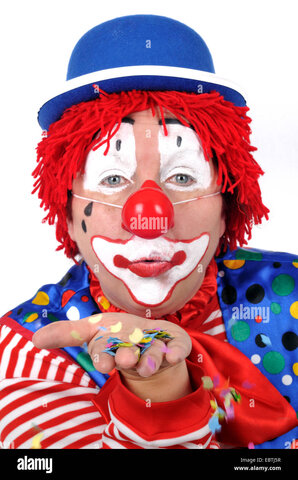 donna-vestito-come-un-clown-soffiando-coriandoli-ebtj5r.jpg.bb7a478af0e0ea174057ce1044756a09.jpg